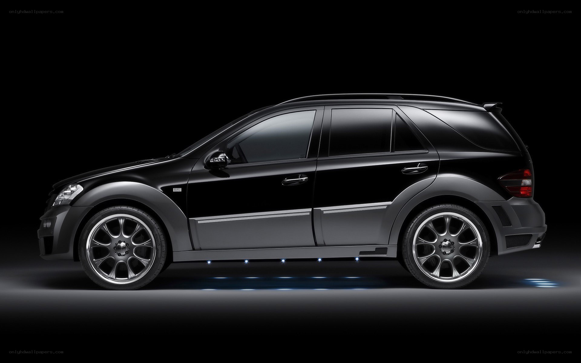 black luxury suv side profile