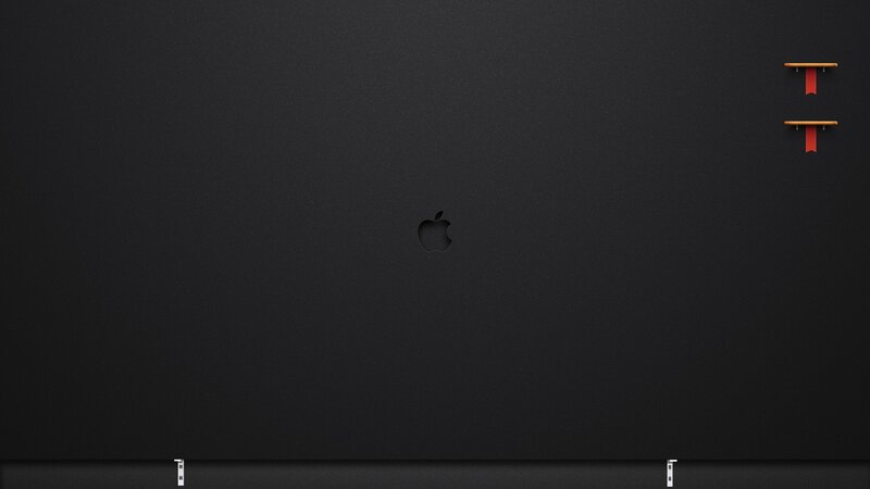Black MacBook with Apple logo