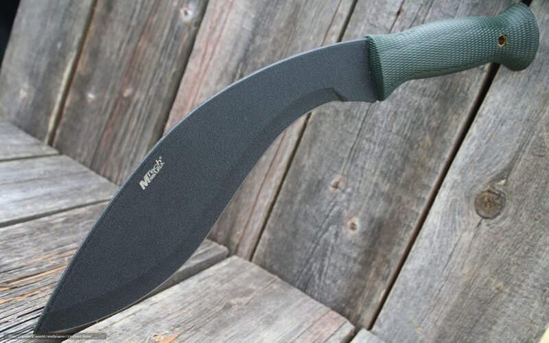 black machete on wood