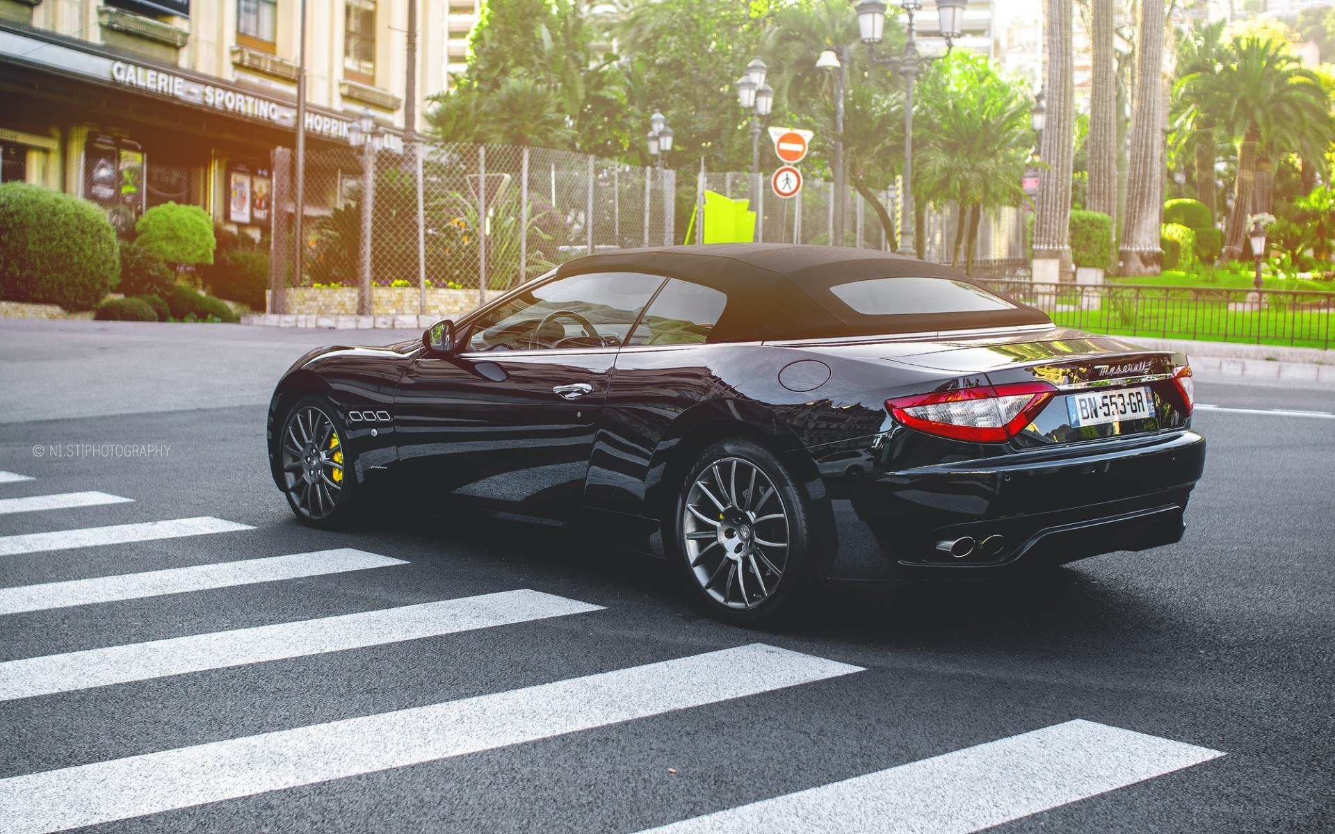 Black Maserati convertible on street