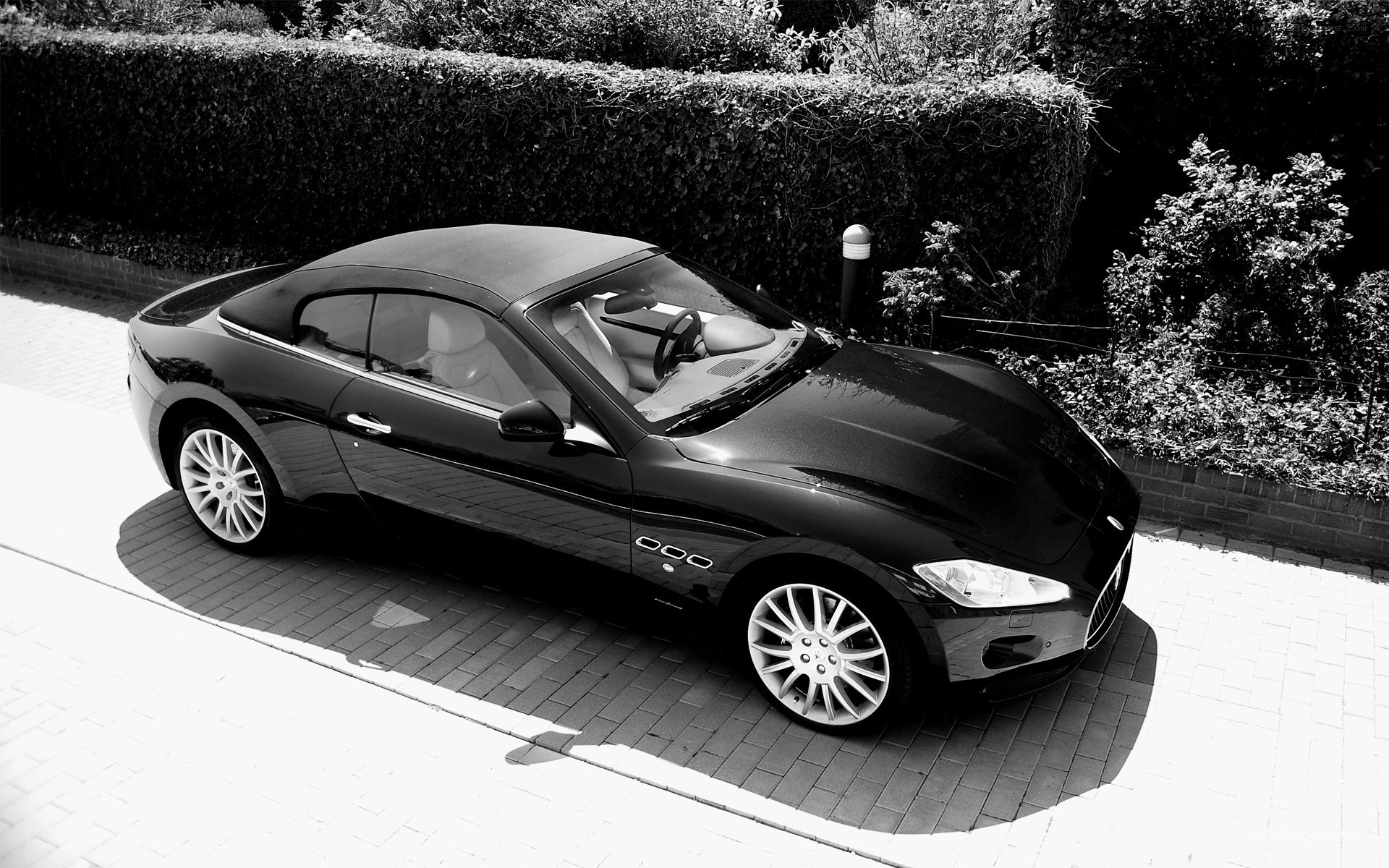 Black Maserati convertible parked