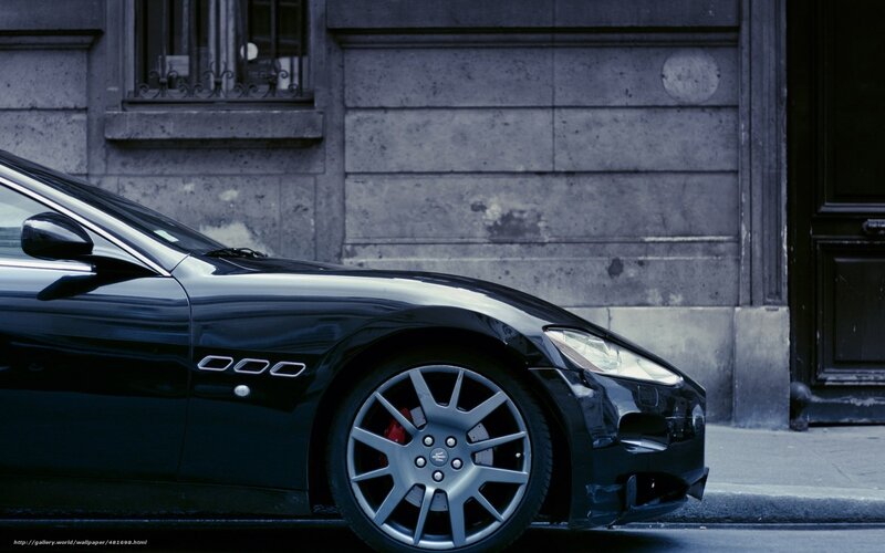 Black Maserati on city street