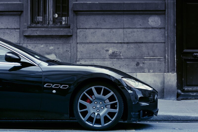 Black Maserati on city street