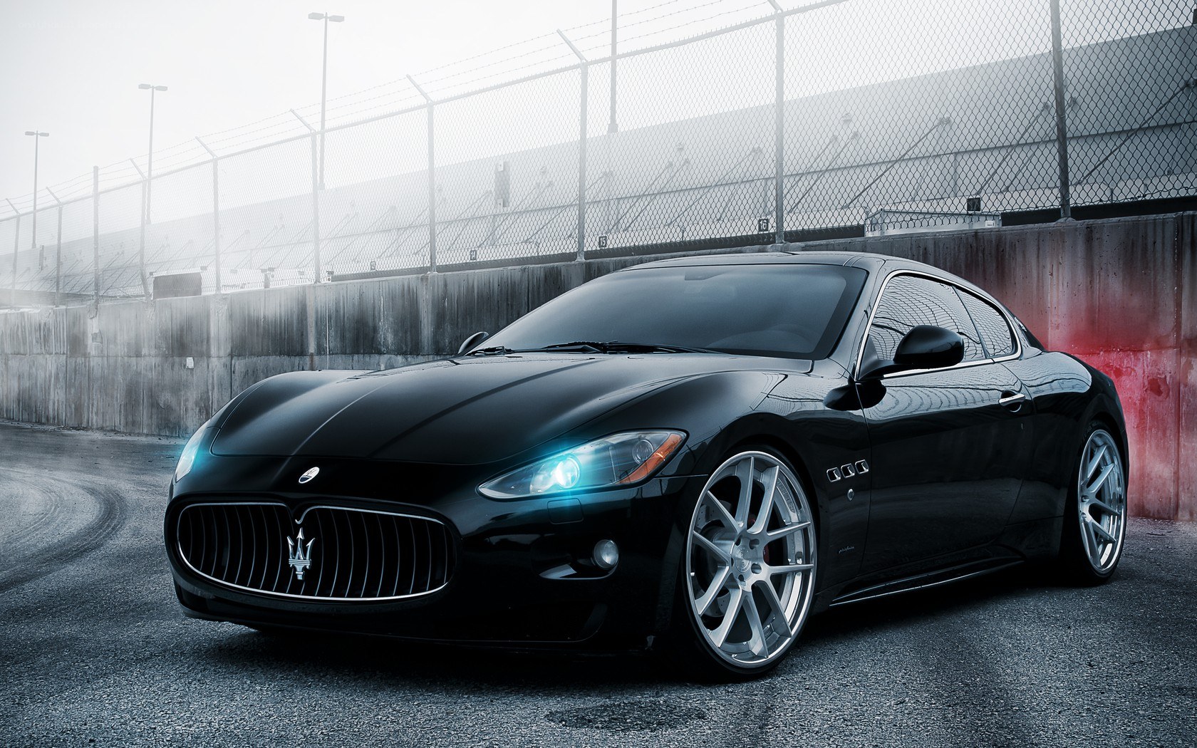 Black Maserati on racetrack