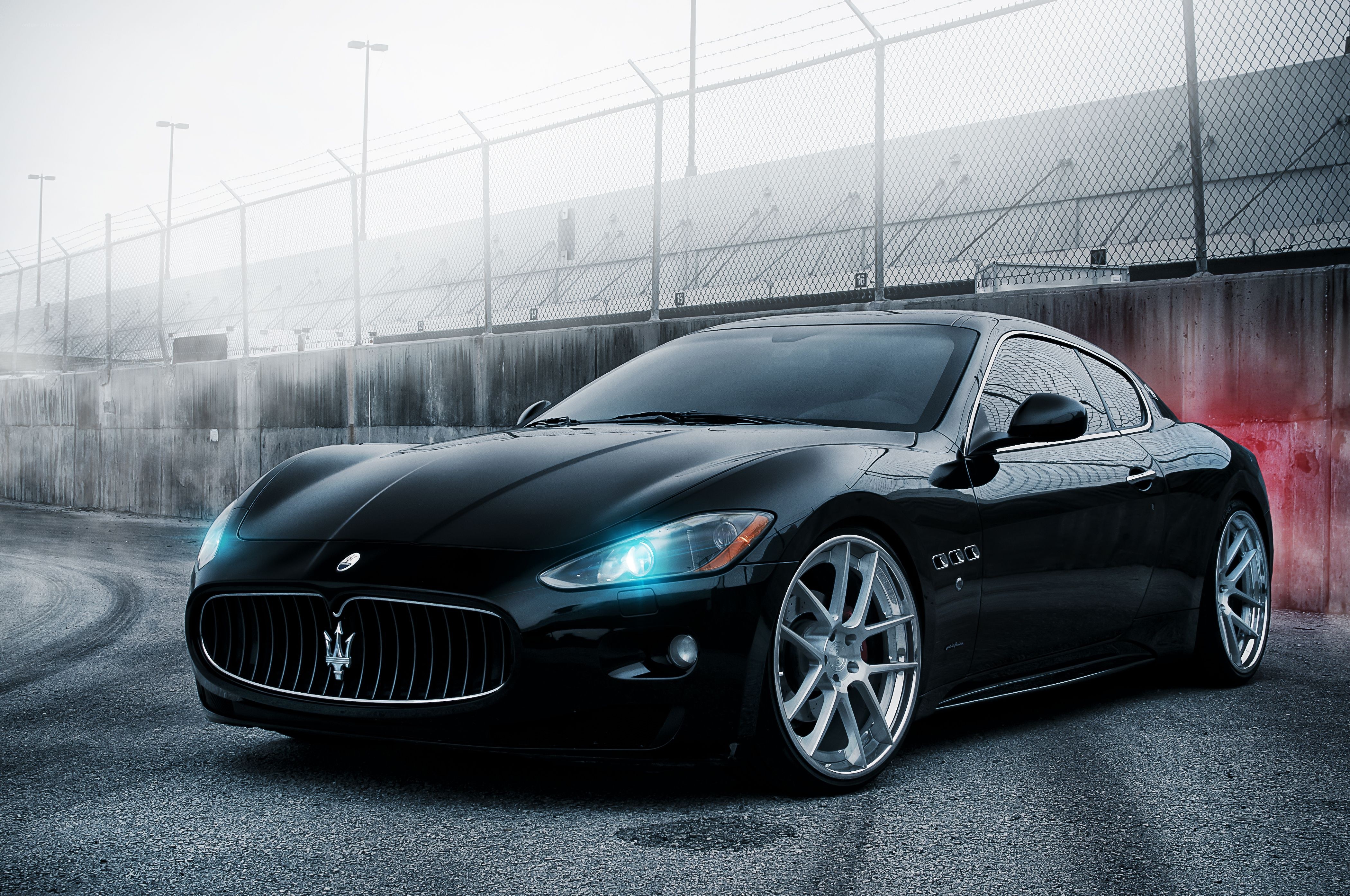 Black Maserati on racetrack