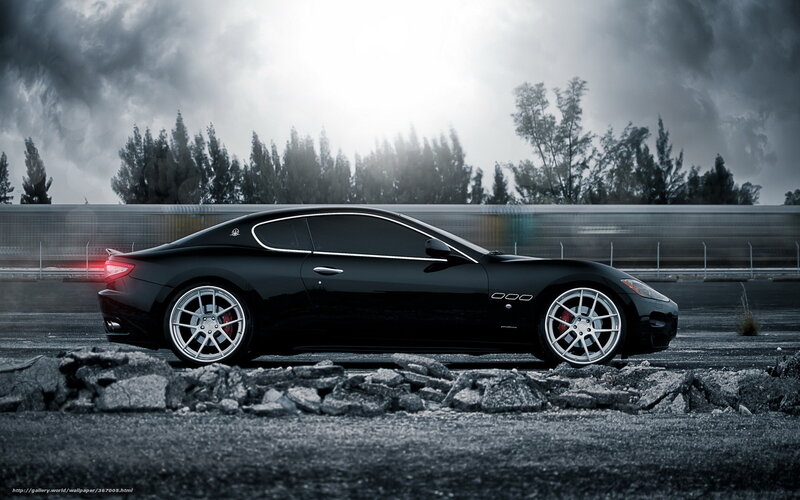 Black Maserati on racetrack