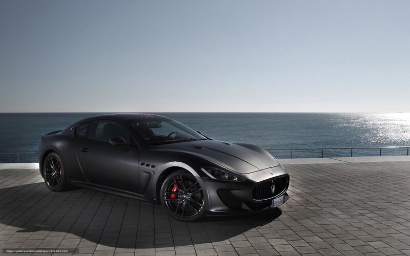Black Maserati on seaside terrace