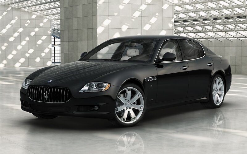 Black Maserati sedan in showroom