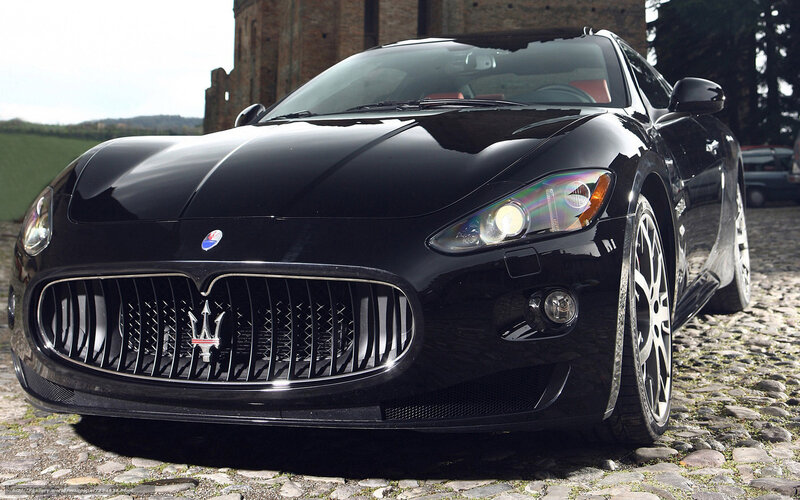 Black Maserati Sports Car — Dramatic, Afternoon, Photograph, Cobblestone