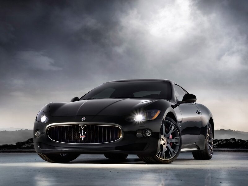 Black Maserati Sports Car — Dramatic, Photograph, Cloudy Sky, Road, Gray