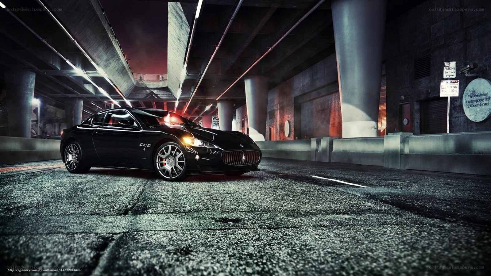 Black Maserati under highway