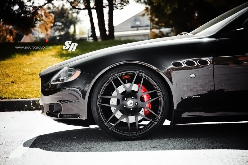 Black Maserati with custom wheels