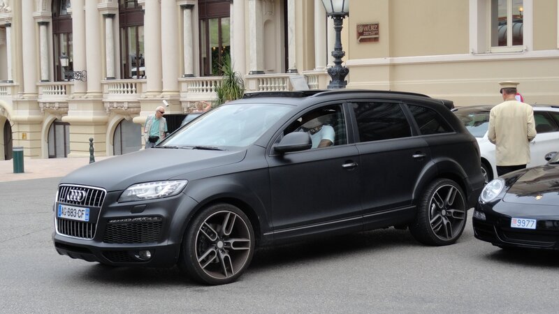 Black matte Audi Q7 on city street