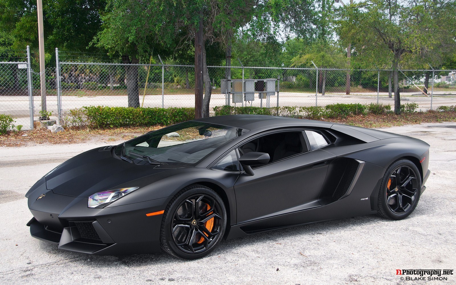 black matte lamborghini parked