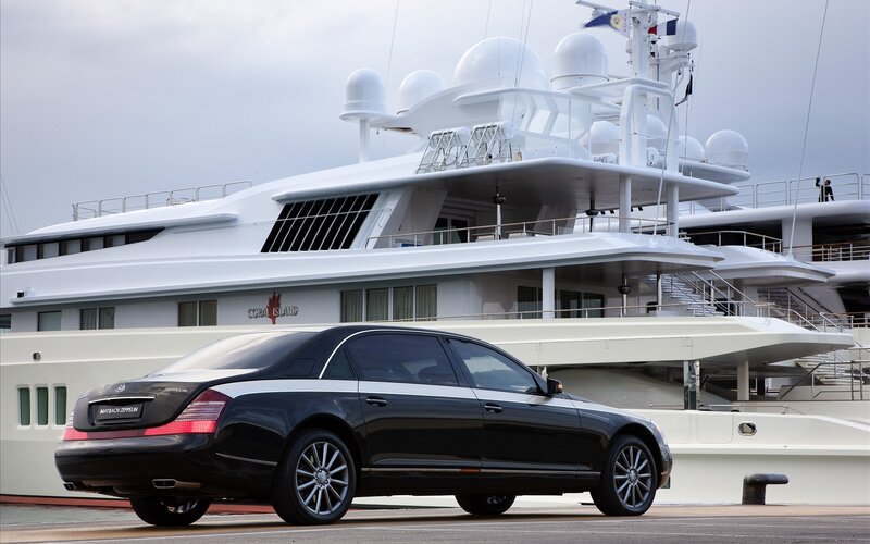 Black Maybach and yacht