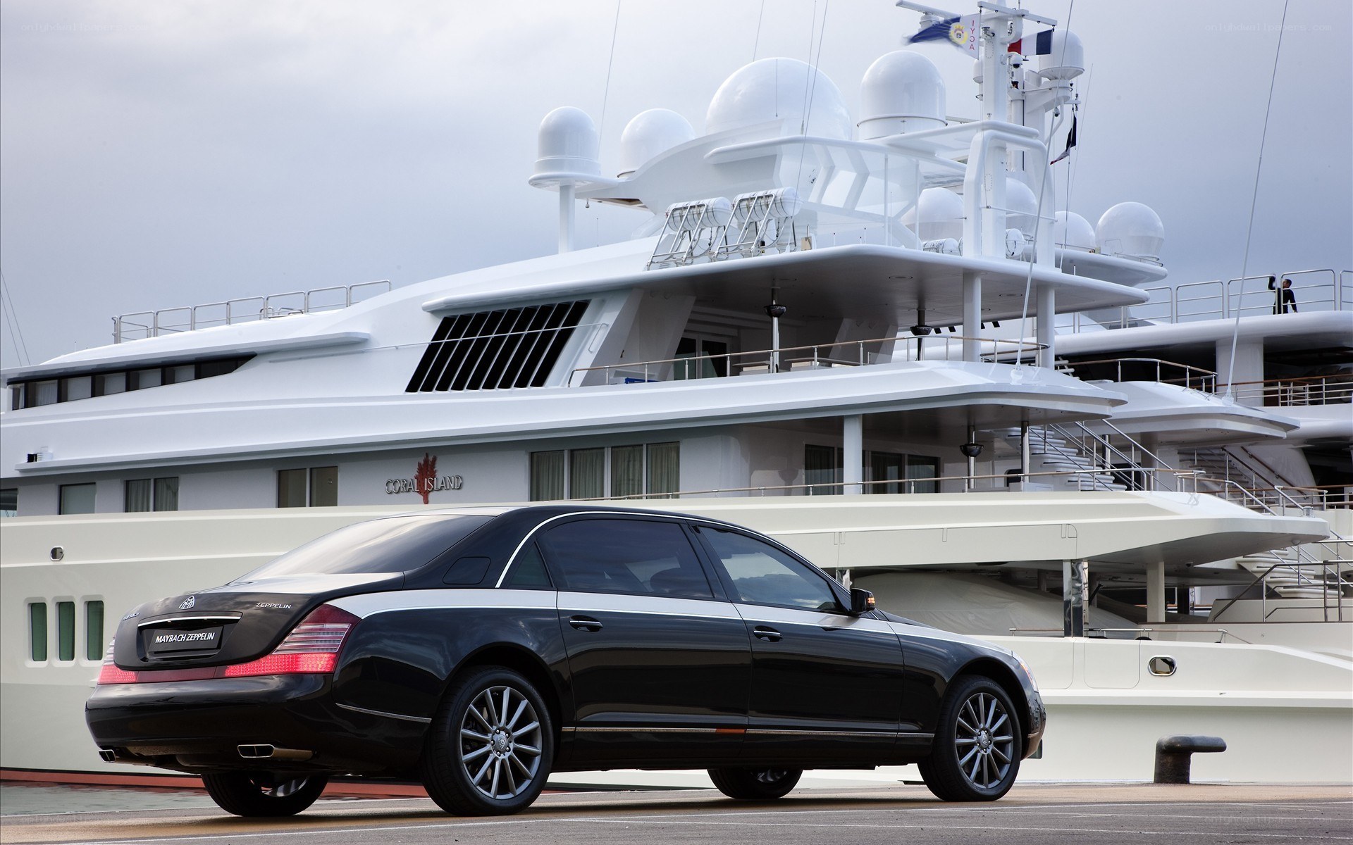 Black Maybach and yacht