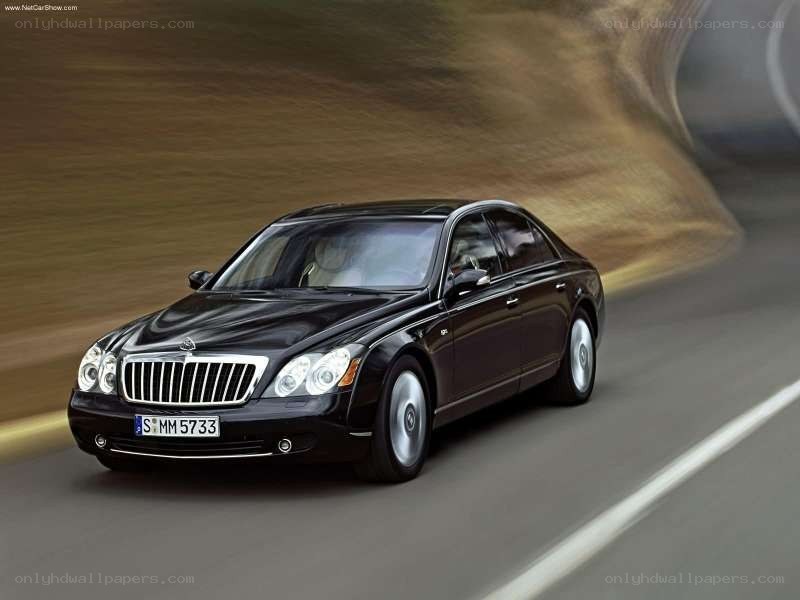 black maybach driving on road