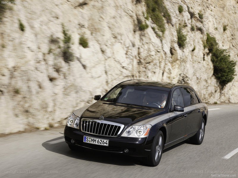 black maybach driving on road