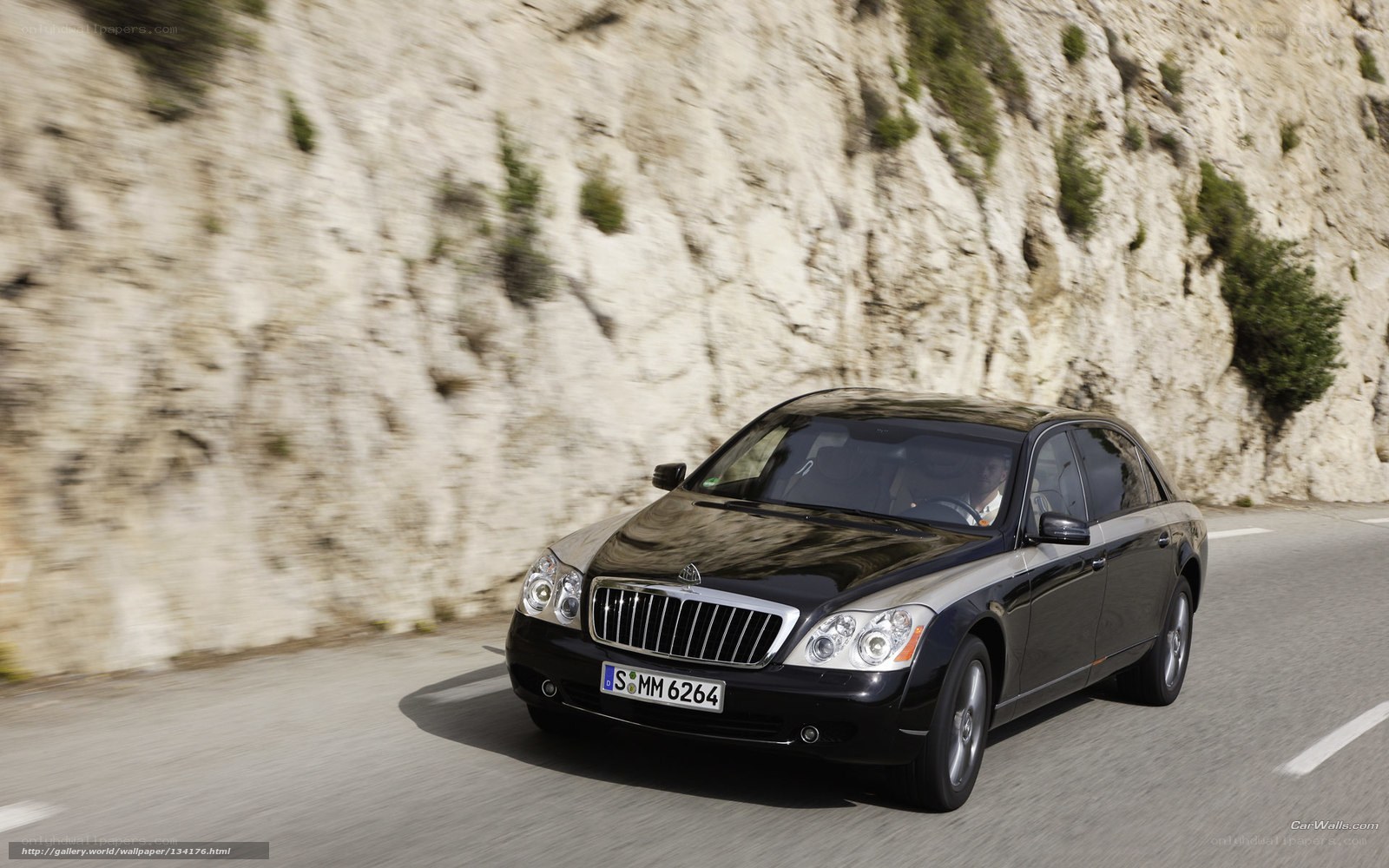 black maybach driving on road