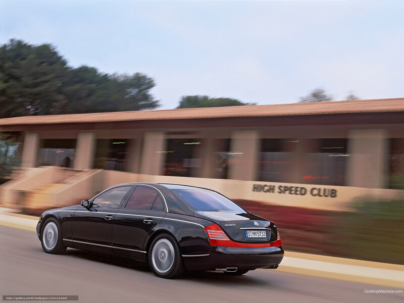 Black Maybach driving past club