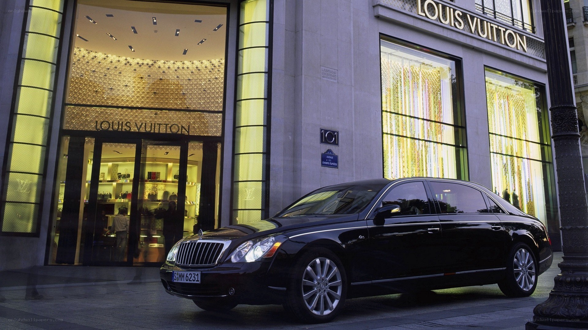 Black Maybach outside Louis Vuitton