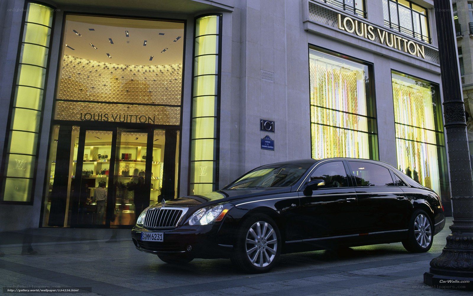 Black Maybach outside Louis Vuitton