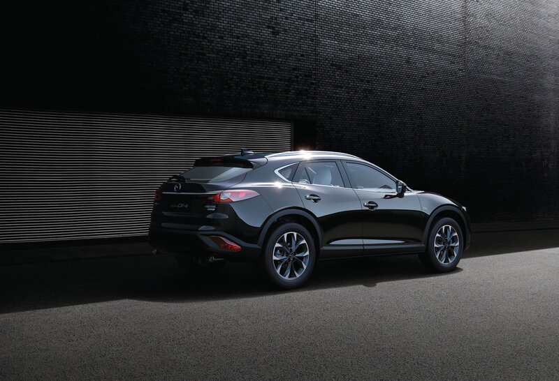 Black Mazda CX-4 in urban setting