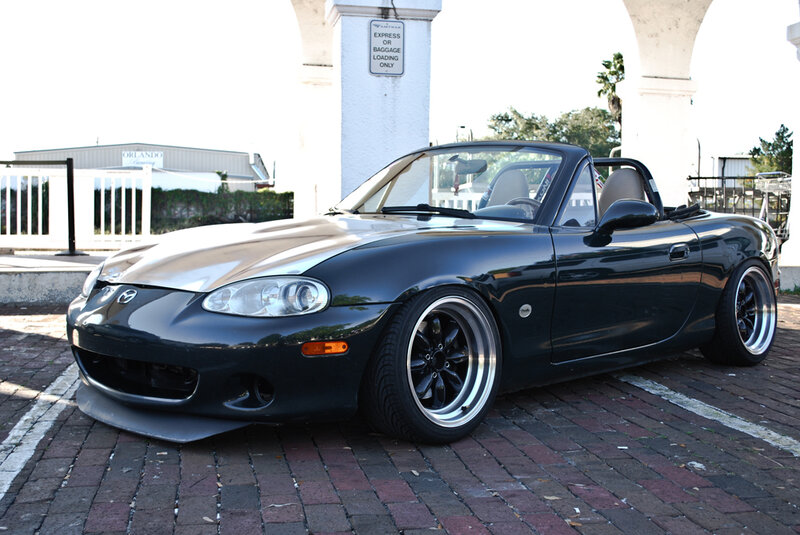 black mazda miata convertible