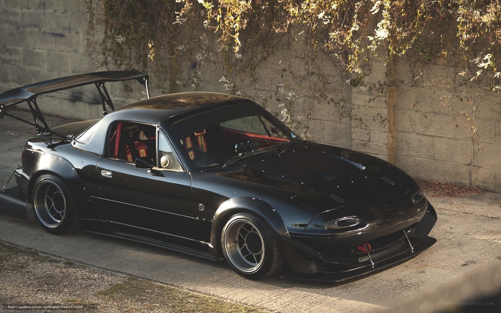 black mazda miata race car
