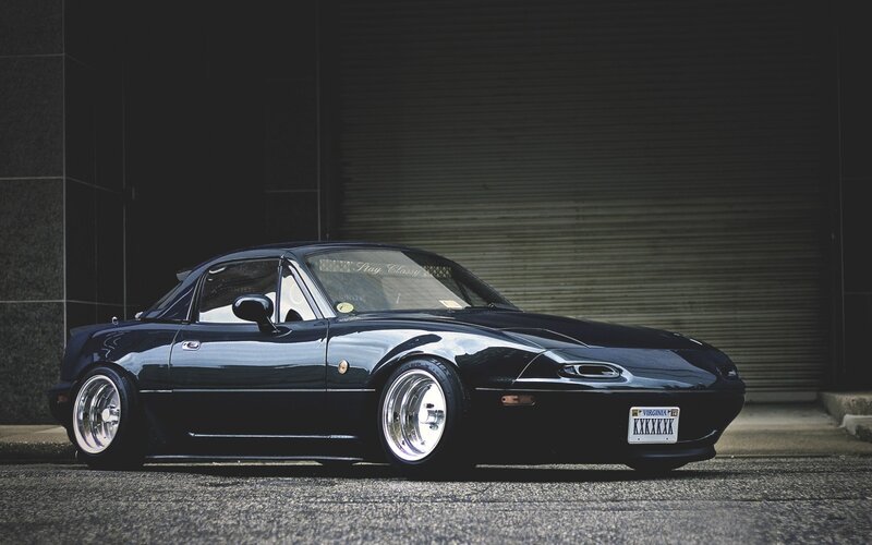 black mazda miata sports car