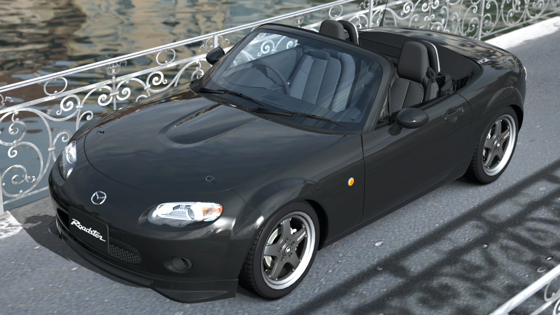 Black Mazda Roadster convertible
