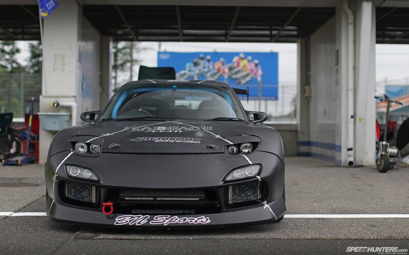 Black Mazda RX-7 race car