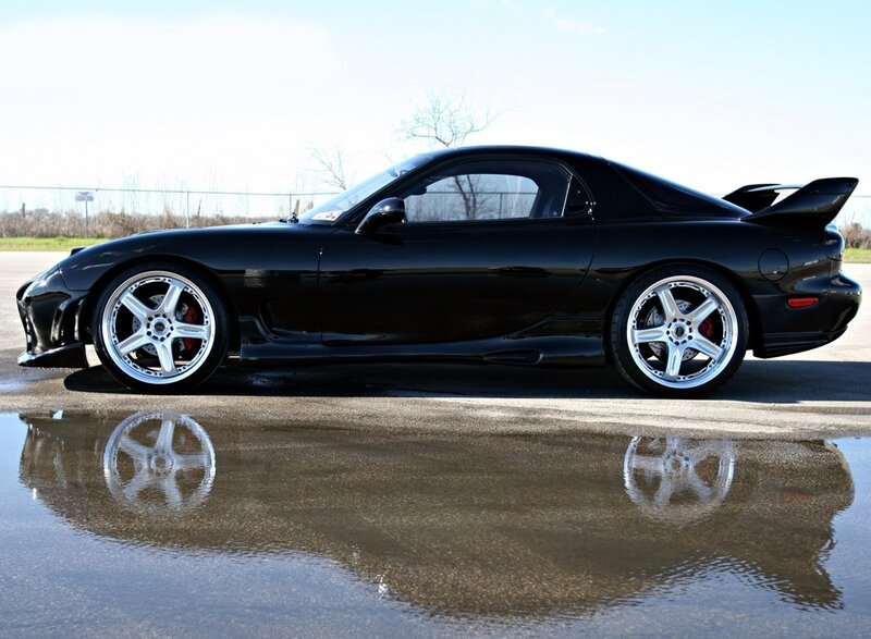 Black Mazda RX-7 sports car