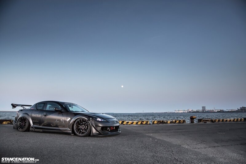 Black Mazda RX-8 by the sea