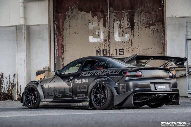 Black Mazda RX-8 with Red Bull livery