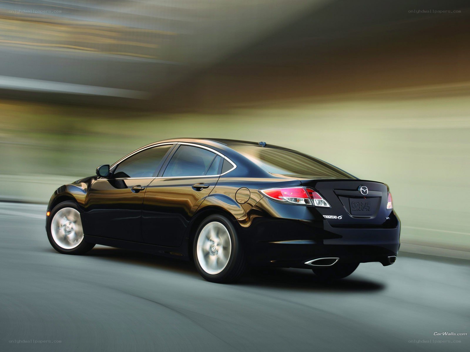 Black Mazda6 in motion