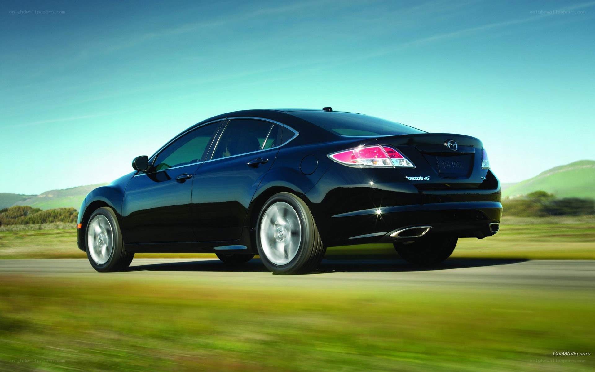 Black Mazda6 in motion