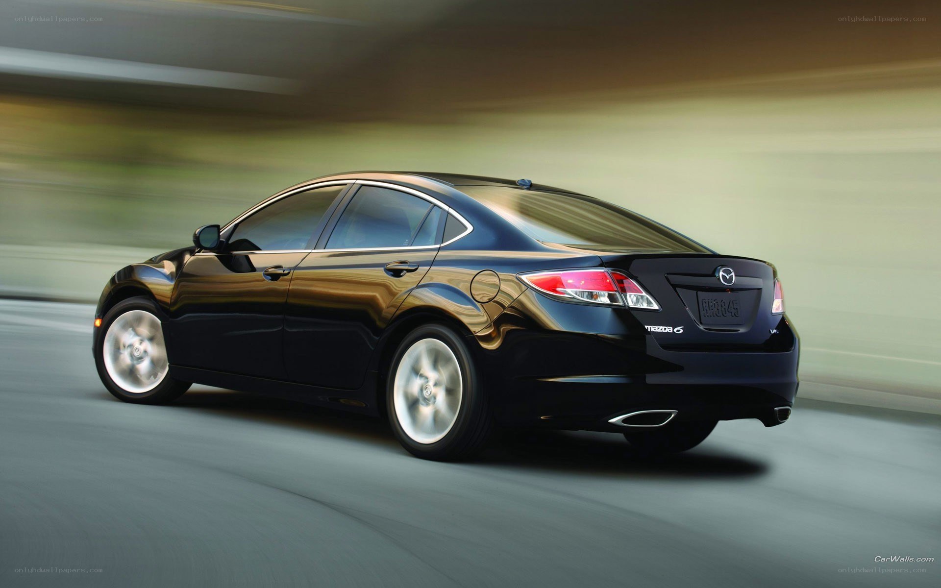 Black Mazda6 in motion