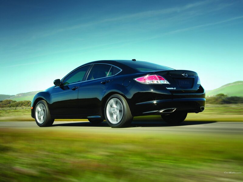 Black Mazda6 in motion