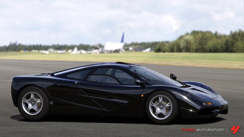 black mclaren f1 on a runway