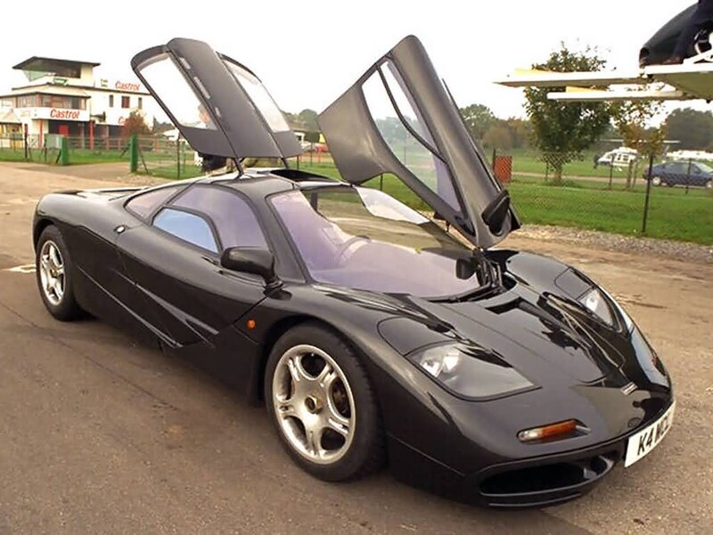 Black McLaren F1 with doors open