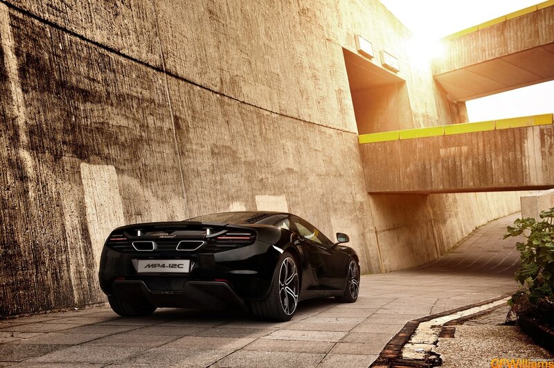 Black McLaren MP4-12C in urban setting