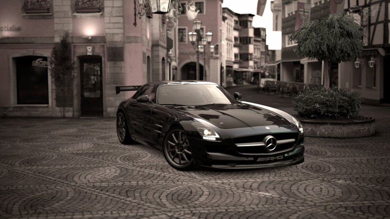 Black Mercedes-AMG on cobblestones