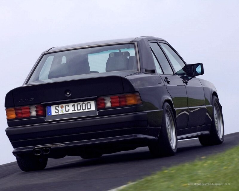 black mercedes-benz amg on road