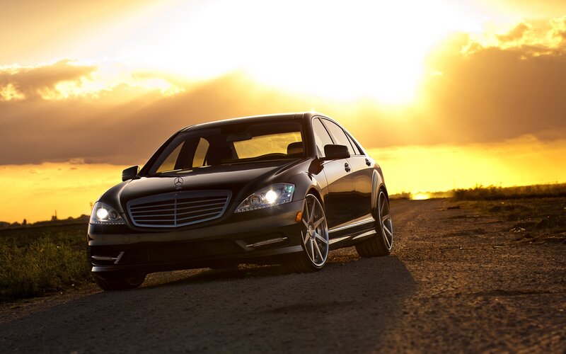 Black Mercedes-Benz at sunset