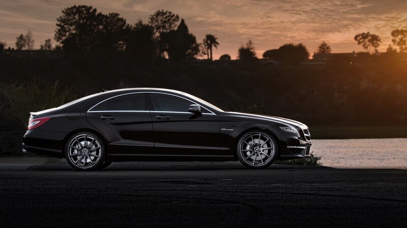 black mercedes-benz at sunset