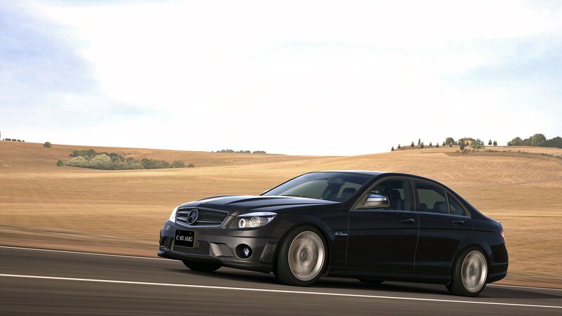 Black Mercedes-Benz C63 AMG on road