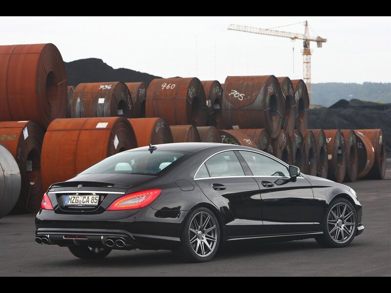 Black Mercedes-Benz CLS in industrial setting