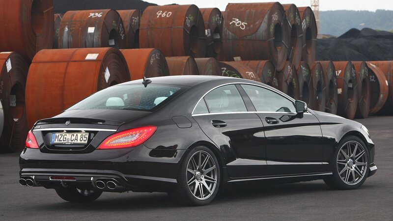 Black Mercedes-Benz CLS in industrial setting
