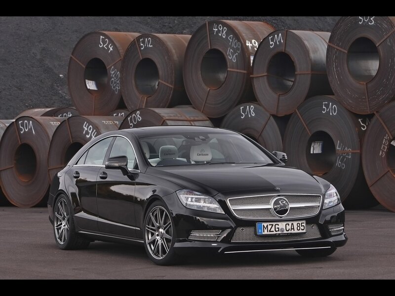 Black Mercedes-Benz CLS in industrial setting